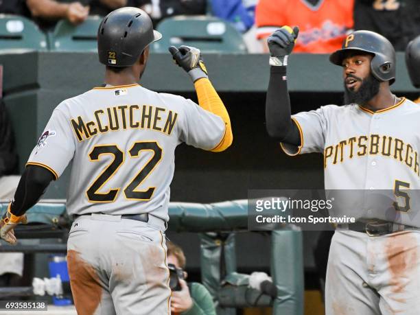 June 07: Pittsburgh Pirates third baseman Josh Harrison congratulates center fielder Andrew McCutchen after scoring in the second inning against the...