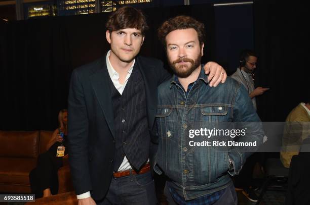 Ashton Kutcher and Danny Masterson pose backstage during the 2017 CMT Music Awards at the Music City Center on June 6, 2017 in Nashville, Tennessee.