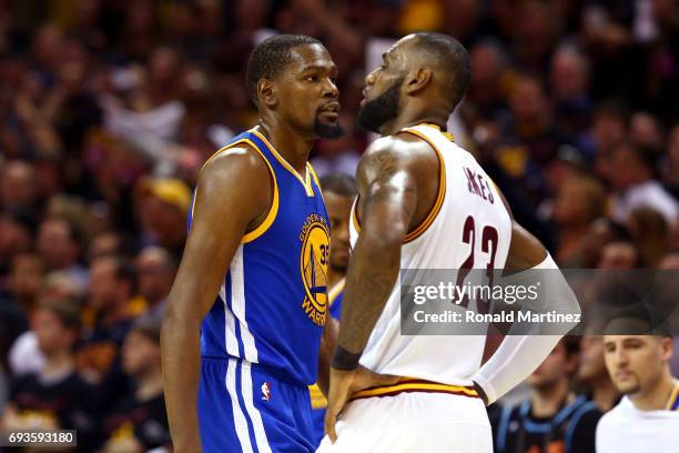 Kevin Durant of the Golden State Warriors and LeBron James of the Cleveland Cavaliers look on in the second quarter in Game 3 of the 2017 NBA Finals...