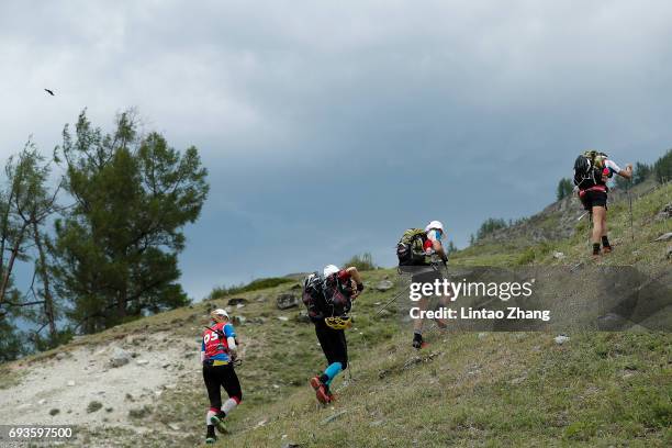 Silver Eensaar , Rain Eensaar, Timoo and Mariann Sulg team of Estonian Ace Adventure compete in the Cross-country run stage of 2017 Xtrail Altay...