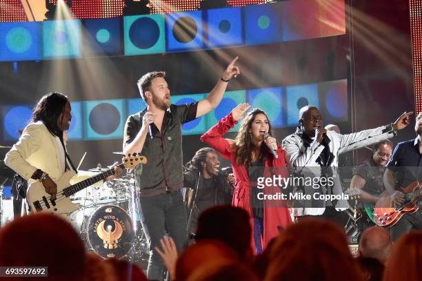 Lady Antebellum and Earth,Wind & Fire Verdine White, Charles Kelley, Hillary Scott, and Ralph Johnson perform onstage during the 2017 CMT Music...