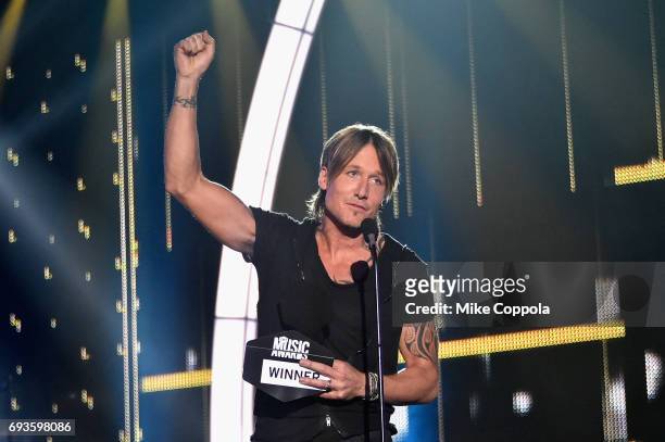 Keith Urban receives Best Male Video of the Year award onstage during the 2017 CMT Music Awards at the Music City Center on June 6, 2017 in...