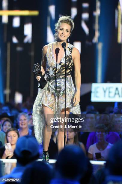 Carrie Underwood accepts the Female Video of the Year Award during the 2017 CMT Music Awards at the Music City Center on June 7, 2017 in Nashville,...