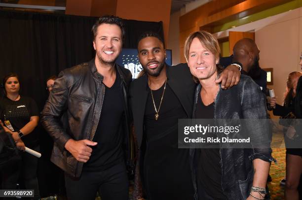 Luke Bryan, Jason Derulo and Keith Urban pose backstage during the 2017 CMT Music Awards at the Music City Center on June 6, 2017 in Nashville,...