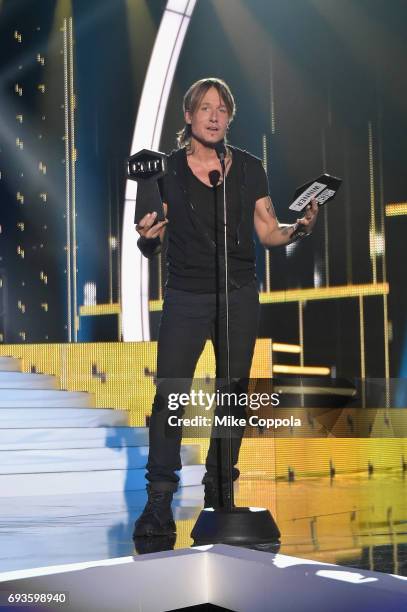 Keith Urban accepts an award onstage during the 2017 CMT Music Awards at the Music City Center on June 6, 2017 in Nashville, Tennessee.