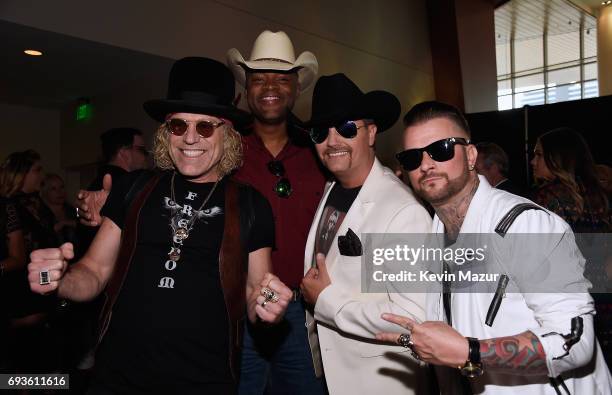 Big Kenny Alphin, Cowboy Troy, John Rich, and DJ Sinister attend the 2017 CMT Music Awards at the Music City Center on June 7, 2017 in Nashville,...