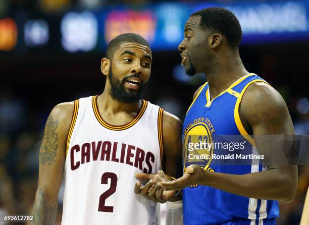 Kyrie Irving of the Cleveland Cavaliers and Draymond Green of the Golden State Warriors exchange words during the second half in Game 3 of the 2017...