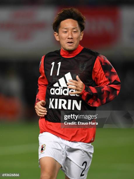 Tomoya Ugajin of Japan warms up during the international friendly match between Japan and Syria at Tokyo Stadium on June 7, 2017 in Chofu, Tokyo,...