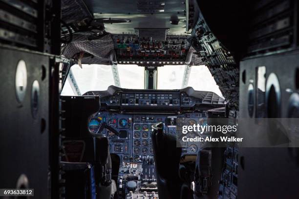 cockpit view of retired supersonic airliner. - concorde stock pictures, royalty-free photos & images