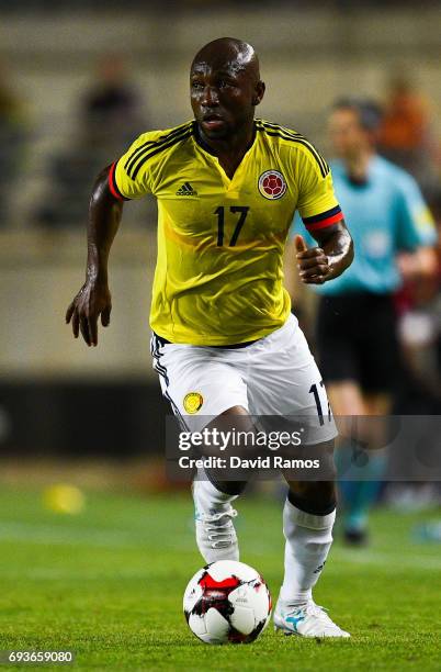 Pablo Armero of Colombia runs with the ball during a friendly match between Spain and Colombia at La Nueva Condomina stadium on June 7, 2017 in...