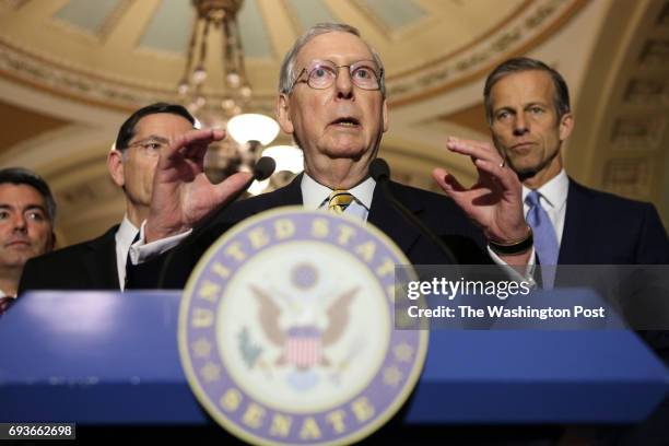 Senate Majority Leader Mitch McConnell of Ky., accompanied by, from left, Sen. Cory Gardner, R-Colo., Sen. John Barrasso, R-Wyo., and Sen. John...