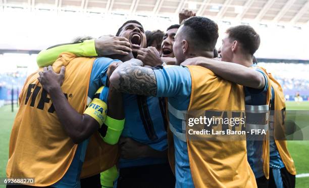 Nicolas de la Cruz of Uruguay celebrates with team mates after scoring his teams first goal during the FIFA U-20 World Cup Korea Republic 2017 Semi...