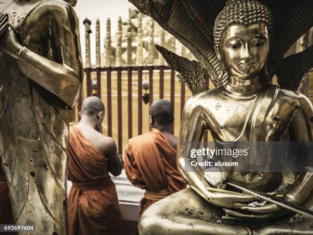 buddhist monks praying at phra that doi suthep chiang mai thailand - buddha purnima stock pictures, royalty-free photos & images