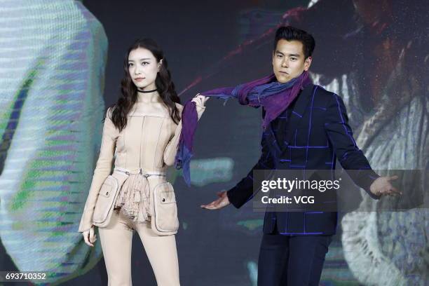 Actor Eddie Peng and actress Ni Ni attend the press conference of film "Wukong" on June 8, 2017 in Beijing, China.