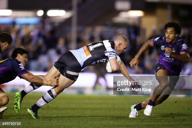 Luke Lewis of the Sharks dives to score a try during the round 14 NRL match between the Cronulla Sharks and the Melbourne Storm at Southern Cross...