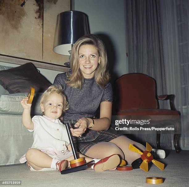 Anna Murdoch, wife of Australian newspaper publisher and businessman Rupert Murdoch pictured sitting with her daughter Elisabeth Murdoch at home in...