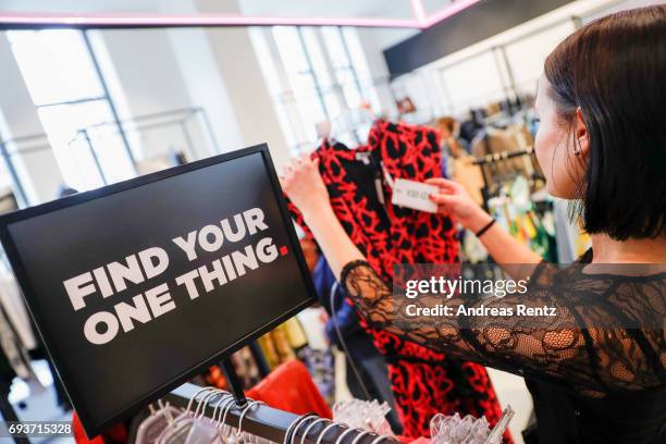 Customer is pictured during the opening of the first European 'Saks OFF 5TH' flagship store at Carsch Haus on June 8, 2017 in Duesseldorf, Germany.