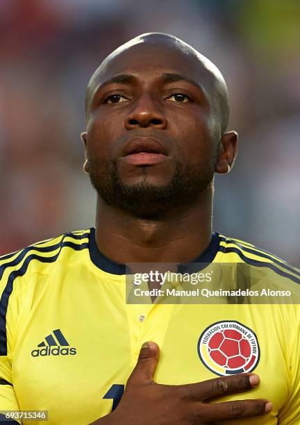 Pablo Armero of Colombia stands for their national athem prior to the international friendly match between Spain and Colombia at Nueva Condomina...