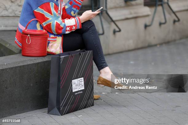 Customer is pictured during the opening of the first European 'Saks OFF 5TH' flagship store at Carsch Haus on June 8, 2017 in Duesseldorf, Germany.