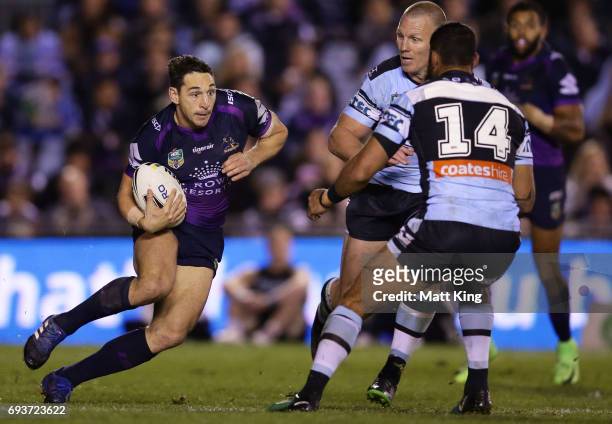 Billy Slater of the Storm runs at the defence during the round 14 NRL match between the Cronulla Sharks and the Melbourne Storm at Southern Cross...
