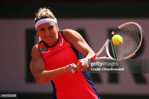 Timea Bacsinszky of Switzerland hits a backhand during the ladies semi final match against Jelena Ostapenko of Latvia on day twelve of the 2017...