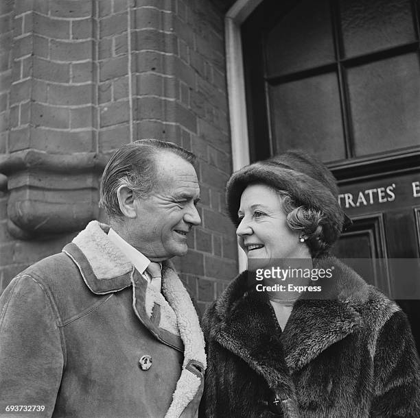 English actor Sir John Mills and his wife, actress and writer Mary Hayley Bell outside Richmond Magistrate's Court where she was sworn in as a new...
