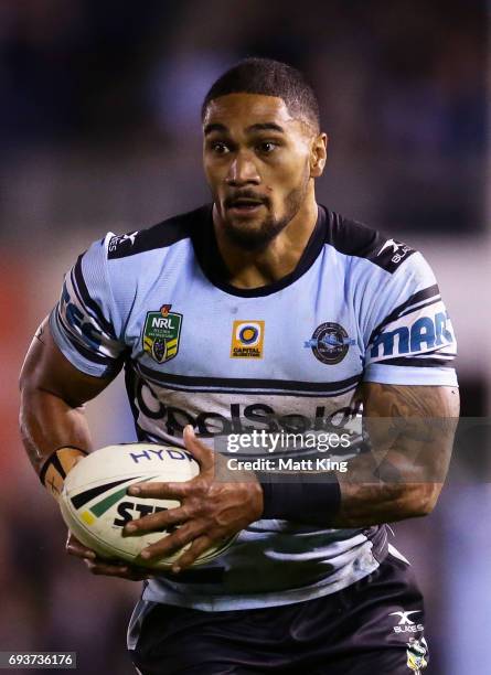 Ricky Leutele of the Sharks runs with the ball during the round 14 NRL match between the Cronulla Sharks and the Melbourne Storm at Southern Cross...
