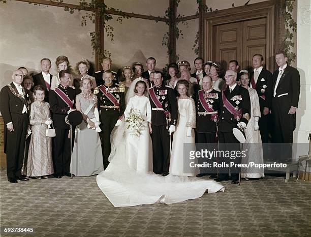 View of the wedding party of Crown Prince Harald of Norway pictured with his wife Sonja Haraldsen , family members and guests following the wedding...