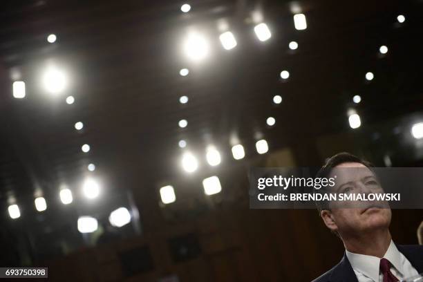 Former FBI Director James Comey arrives to testify during a US Senate Select Committee on Intelligence hearing on Capitol Hill in Washington,DC, June...