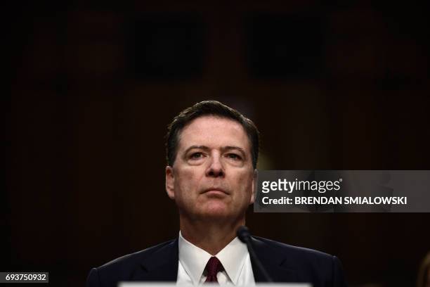 Former FBI Director James Comey arrives to testify during a US Senate Select Committee on Intelligence hearing on Capitol Hill in Washington,DC, June...