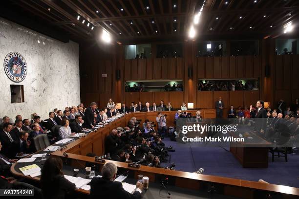 Former FBI Director James Comey is sworn in before testifying before the Senate Intelligence Committee in the Hart Senate Office Building on Capitol...