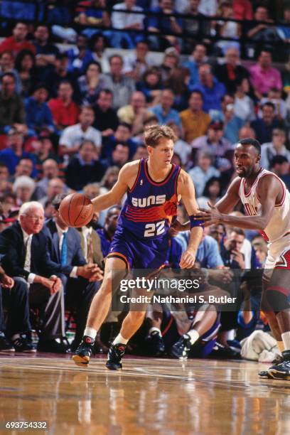 Danny Ainge of the Phoenix Suns handles the ball during the game against the Chicago Bulls during Game Three of the 1993 NBA Finals on June 13, 1993...
