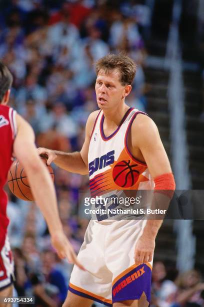 Danny Ainge of the Phoenix Suns handles the ball during the game against the Chicago Bulls during Game Two of the 1993 NBA Finals on June 11, 1993 at...