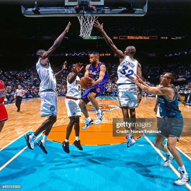 Damon Stoudamire of the Toronto Raptors looks to pass the ball during the game during the 1996 Rookie Challenge played on February 10, 1996 at the...