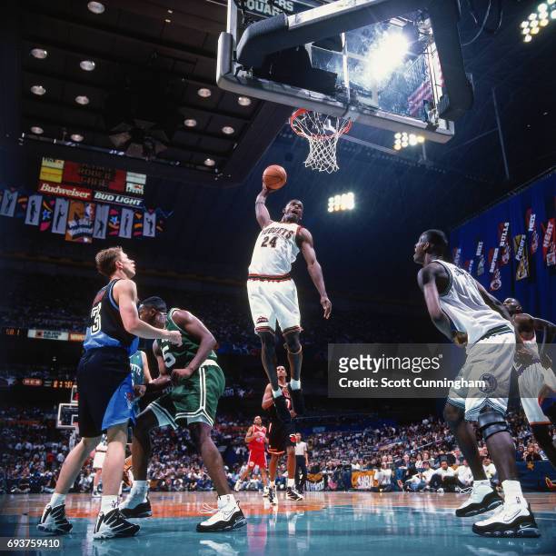 Antonio McDyess of the Denver Nuggets dunks the ball during the game during the 1996 Rookie Challenge played on February 10, 1996 at the Alamodome in...