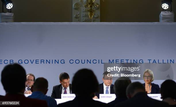 From left to right, Vitor Constancio, vice president of the European Central Bank , Ardo Hansson, governor of the Estonian central bank, Mario...