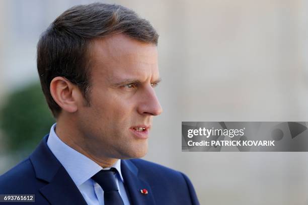 French President Emmanuel Macron is pictured during a joint press conference with the Peruvian president following talks at the Elysee Presidential...