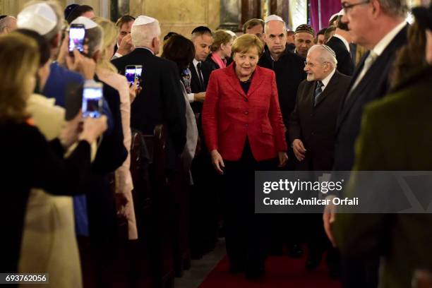 German Chancellor Angela Merkel, Mayor of Buenos Aires Horacio Rodriguez Larreta and Rabbi Simon Moguilevsky walk into the Templo Libertad prior the...