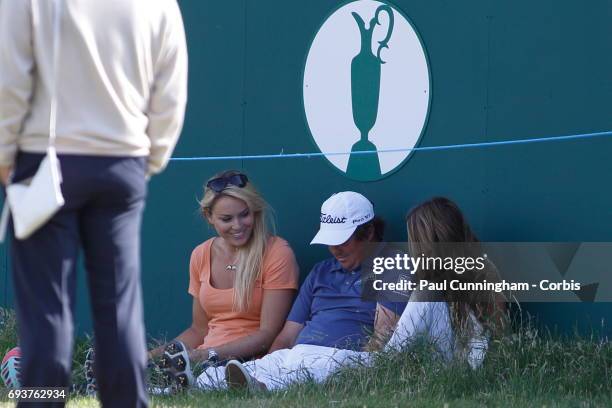 Lindsey Vonn with Nadine Moze having fun with Jason Dufner taking selfie pictures while performing the 'vacant pose', a craze Jason started, on the...