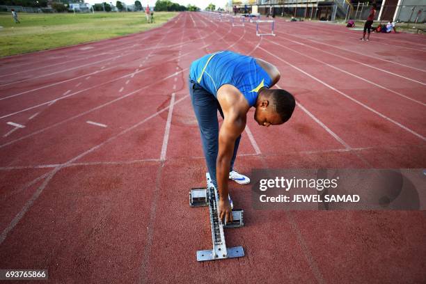 Local sprinter trains in an outfield track at the national stadium in Kingston, Jamaica, on June 8, 2017. Usain Bolt's imminent retirement is a blow...