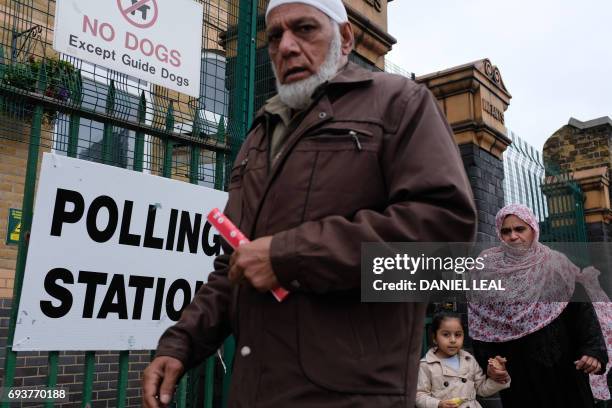 People leave a polling station in Ilford, east London, on June 8 as Britain holds a general election. - As polling stations across Britain open on...