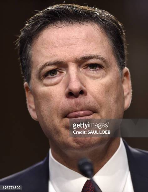 Former FBI Director James Comey testifies before the US Senate Select Committee on Intelligence hearing on Capitol Hill in Washington, DC, June 8,...