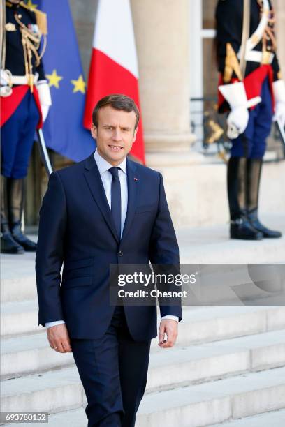 French President Emmanuel Macron arrives to make a statement with Peruvian President Pedro Pablo Kuczynski during a press conference after their...