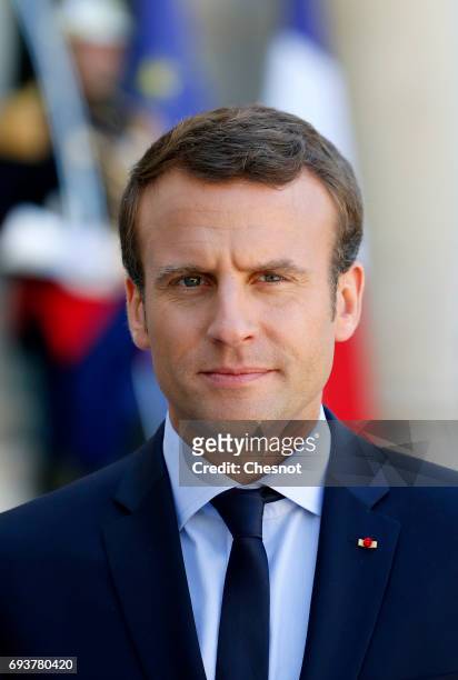 French President Emmanuel Macron makes a statement next to Peruvian President Pedro Pablo Kuczynski during a press conference after their meeting at...