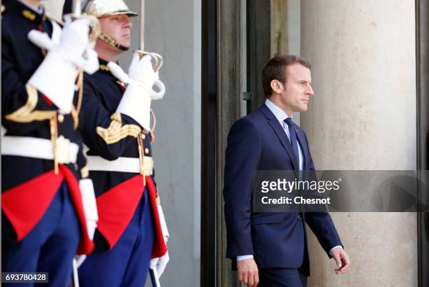 French President Emmanuel Macron looks on as he waits for Peruvian President Pedro Pablo Kuczynski prior to their meeting at the Elysee Presidential...