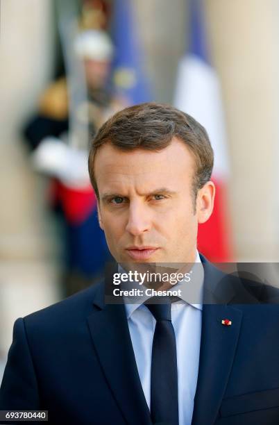 French President Emmanuel Macron makes a statement next to Peruvian President Pedro Pablo Kuczynski during a press conference after their meeting at...