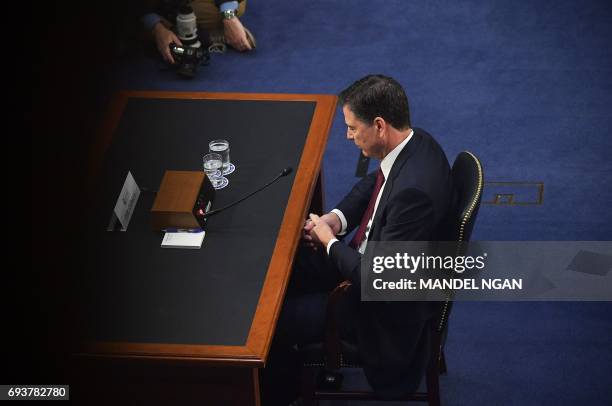 Former FBI director James Comey speaks during a hearing before the Senate Select Committee on Intelligence on Capitol Hill June 8, 2017 in...