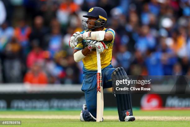 Kusal Mendis of Sri Lanka looks on after being run out during the ICC Champions trophy cricket match between India and Sri Lanka at The Oval in...