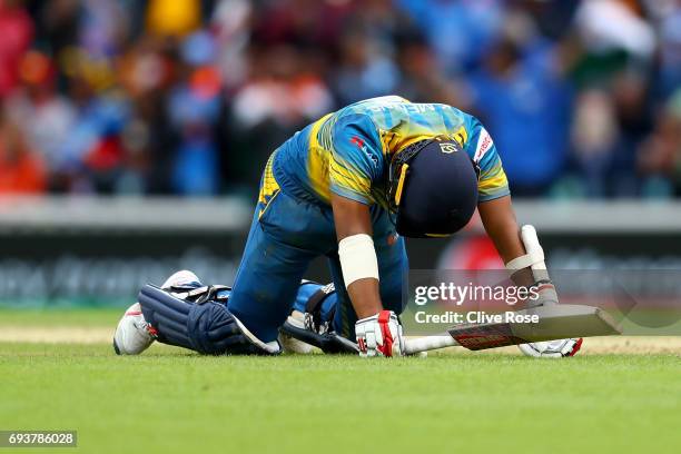 Kusal Mendis of Sri Lanka looks on after being run out during the ICC Champions trophy cricket match between India and Sri Lanka at The Oval in...