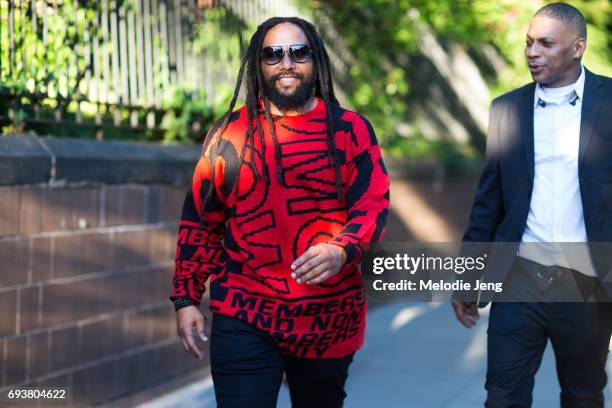 Musician Ky-Mani Marley wears a red Stella McCartney Members print intarsia sweater outside the Stella McCartney Spring 18 presentation on June 8,...